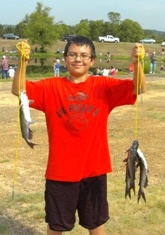 Boy Shows Off His Big Catch